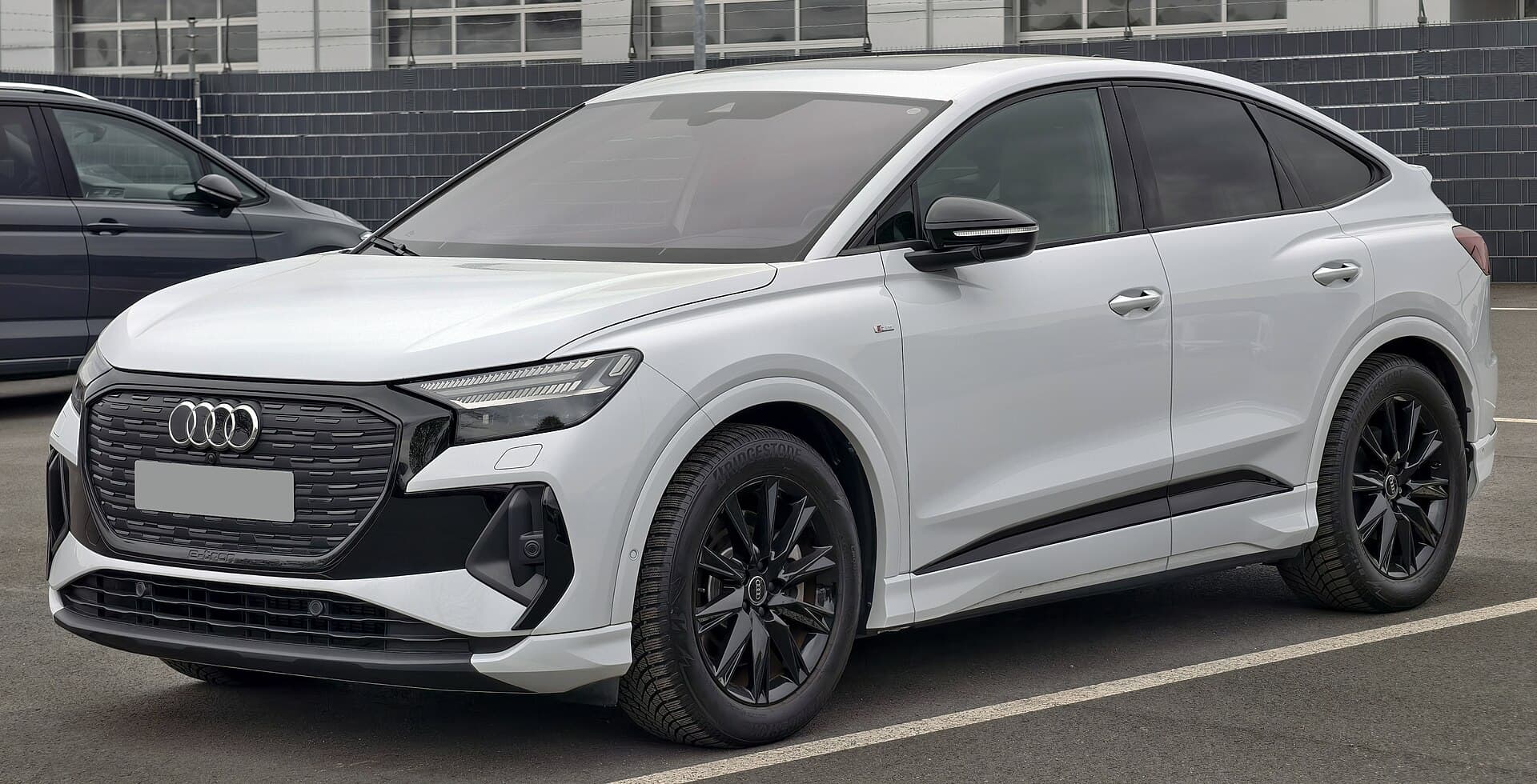 2026 Audi Q4 Sportback e-tron S line front three-quarter view