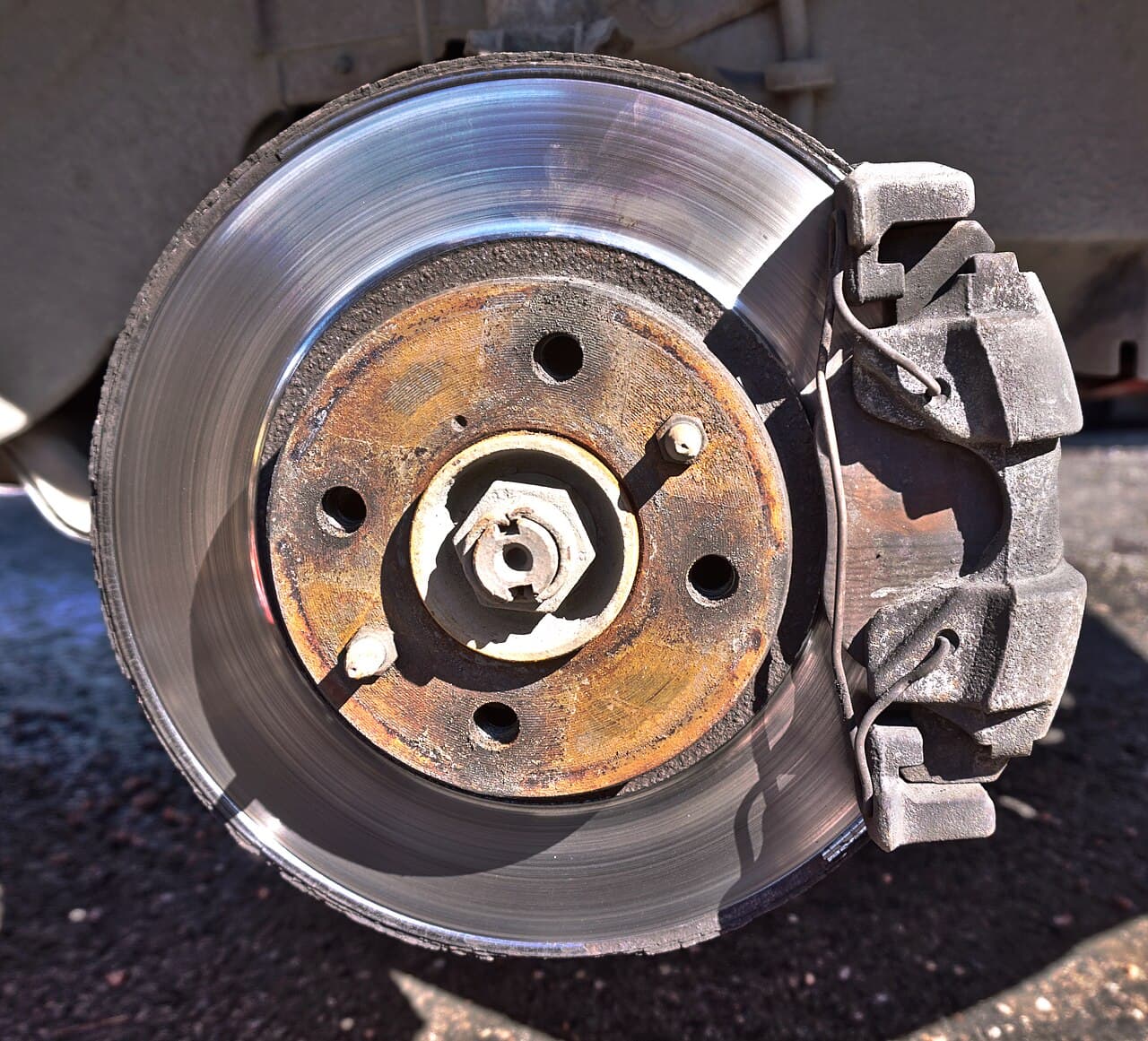 Automotive brake rotor and caliper